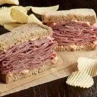 Hot Corned Beef Sandwich · 1/2 pound of hot corned beef. Your choice of bread, topped the way you like it.
