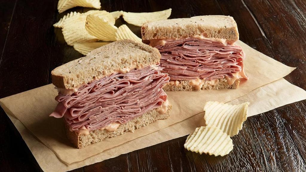Hot Corned Beef Sandwich · 1/2 pound of hot corned beef. Your choice of bread, topped the way you like it.