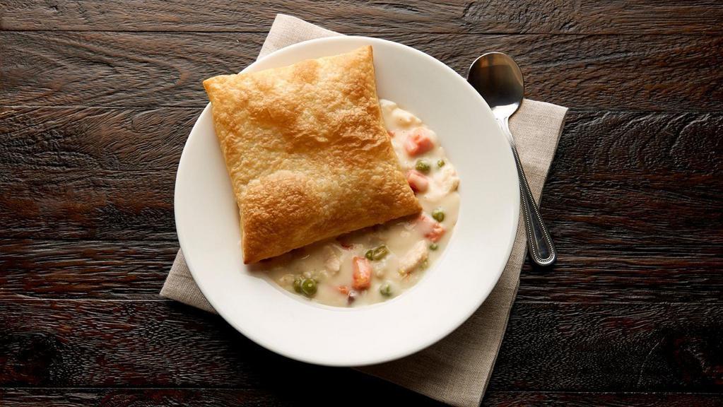 Chicken Pot Pie · Tender chicken, red potatoes, carrots, celery, green peas and spices are mixed with a creamy sauce and topped with a golden, flaky puff pastry. In a bowl, it’s a meal. Our Chicken Pot Pie is simply scrumptious comfort food.