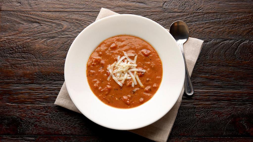 Tomato Basil · A delectable blend of sweet cream, vine ripened tomatoes, virgin olive oil, garlic and fresh-chopped basil makes this vegetarian soup rich…and very famous. Topped with real shredded asiago, you’ll taste honest-to-goodness flavor in every spoonful. A gluten-sensitive choice!