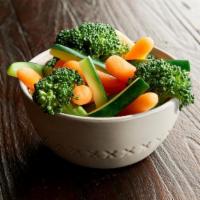 Steamed Veggies  · A healthy blend of steamed broccoli, zucchini and organic baby carrots.