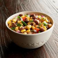 Roasted Corn & Black Bean Salad · A mix of fire-roasted corn, black beans, Roma tomatoes, red onions, cilantro, fresh jalapeño...