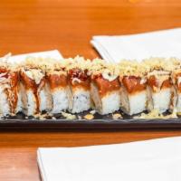 Maki Fire · *in - shrimp tempura, cucumber, crabmeat top - spicy tuna, tempura flakes
sauce