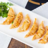 Dumplings · Your choice of pork or chicken,  prepared steamed or pan-fried.