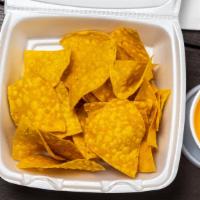 Chips And Queso · Add ground beef for an additional charge.