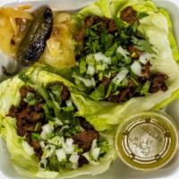 Lettuce Wrap Tacos · Fresh lettuce leaves with choice of meat, onion and cilantro comes with grill onion, grill j...