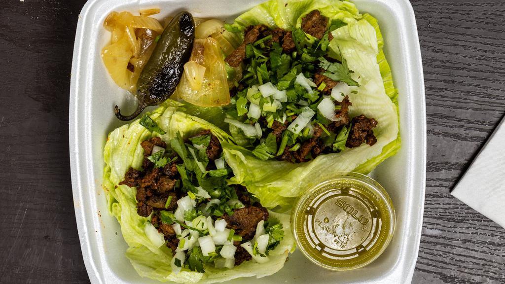 Lettuce Wrap Tacos · Fresh lettuce leaves with choice of meat, onion and cilantro comes with grill onion, grill jalapeno, lime and green or red hot sauce.