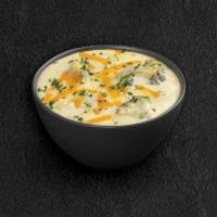 White Cheddar Broccoli Cheese Soup · A creamy blend of white cheddar cheeses with broccoli