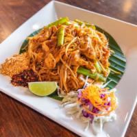 Pad Thai · Contains peanuts. Thin rice noodle pan fried with egg, scallions, crushed peanuts, bean spro...
