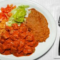 Guisada Plate · Beef chunks with gravy, served with rice, beans and and guacamole salad.