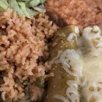 Green Enchiladas · Green chicken enchiladas with melted cheese, served with rice, beans and salad.