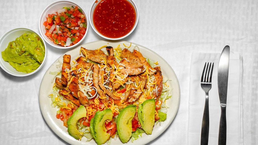 #18. Grilled Chicken Salad · Grilled chicken fajita with avocado, tomatoes & cheese.