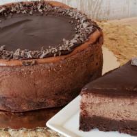 Brownie Chocolate Cheesecake · This cake consists of three layers. The bottom is deep deep brownie, so you can feel the dar...