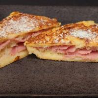 Monte Cristo · Honey Ham, Mayo, and Swiss cheese on our made-from-scratch white bread.  Smothered in Egg an...