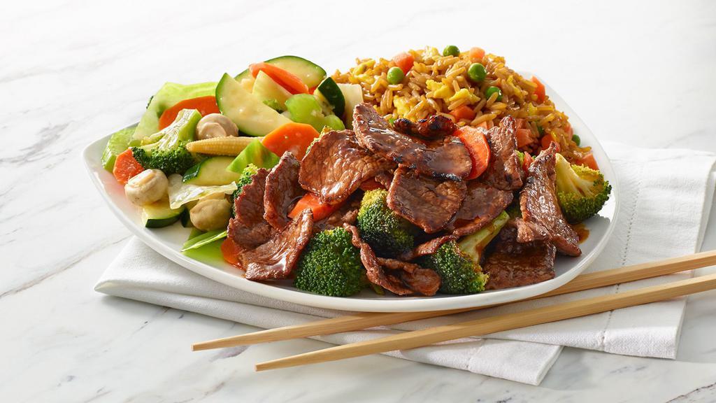Beef & Broccoli  · Beef sautéed with fresh broccoli florets and coated in a savory sauce, served with mixed vegetables and your choice of rice or noodles. (620-830 Cals)