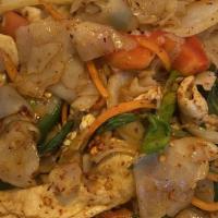Pad Kee Mao (Drunken Noodles) · Spicy. Stir-fried flat rice noodles in spicy sauce with tomatoes, basil, red bell pepper, ca...