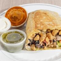 Chicken Burritos · Rice, beans, lettuce, sour cream, tomatoes, and salsa.