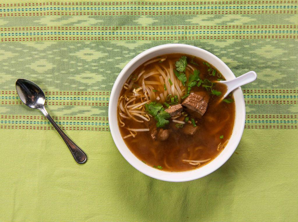 Guay Tiew Nuer Sod (Beverages) · Thai style beef noodle soup. Rice noodles flavored in thai style beef soup with fresh sliced beef, bean sprouts, green onions, fried garlic, and cilantro.