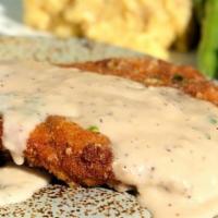 Chicken Fried Steak Blue Plate Special · Our Classic chicken fried steak, with a country-style cream gravy, roasted garlic mashed pot...
