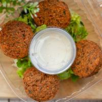 4 Falafel · Fried ball made from beans.