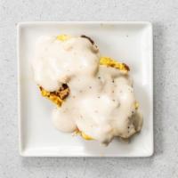 The Eye-Opener · Two biscuits covered in black pepper gravy, with sausage (or vegetarian beyond breakfast sau...