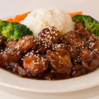 Sesame Chicken · Crispy, fresh chicken breast cubed and marinated in sesame sauce, topped with crunchy sesame...