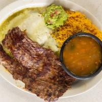 Tampiquena Plate · Asada steak, 2 green chicken enchilada, rice, refried beans. Served with guacamole and torti...