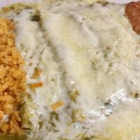 Enchilada Plate · One enchilada with rice and refried beans.
