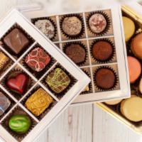 27 Pieces Combination Box · Twenty seven pieces of single origin chocolate combined with only the finest ingredients, ha...