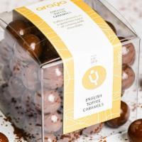 Chocolate Covered Nuts Or Caramel · Six oz.