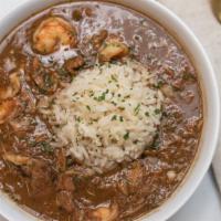 8 Oz Cup Gumbo Ala Nola · Original Louisiana style gumbo consisting of chicken, sausage, and shrimp served with rice a...