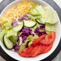 Small Mixed Green Salad · Lettuce, tomato, purple onions, purple cabbage, cucumbers, and mixed cheese.