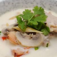 Tom Kha · 16 oz. Coconut soup with fresh mushrooms, red onion, chili, kaffir lime leaves, and lemon ju...