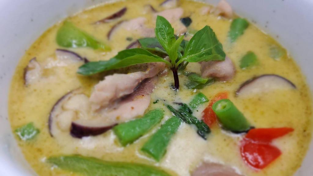 Green Curry · Spicy. Thai green curry paste with eggplant, green bean, basil, bell pepper, and coconut milk.