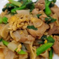 Pad See Ew · Choice of chicken, Tofu, Beef or shrimp. Stir fry flat rice noodles with Chinese broccoli, e...