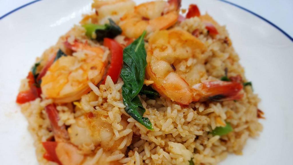 Basil Fried Rice · Spicy. Choice of chicken, Tofu, Beef or Shrimp. Choice of meat fried rice with bell pepper, white onion, basil, and chili.
