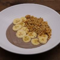 Monkey Acai Bowl · Granola topped with acai berry puree,
bananas, peanut butter, oat milk,
drizzled with agave.