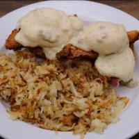 Southern Benny · Bacon, fried chicken, poached eggs, toasted
biscuit topped with Country Sausage Gravy.
Serve...