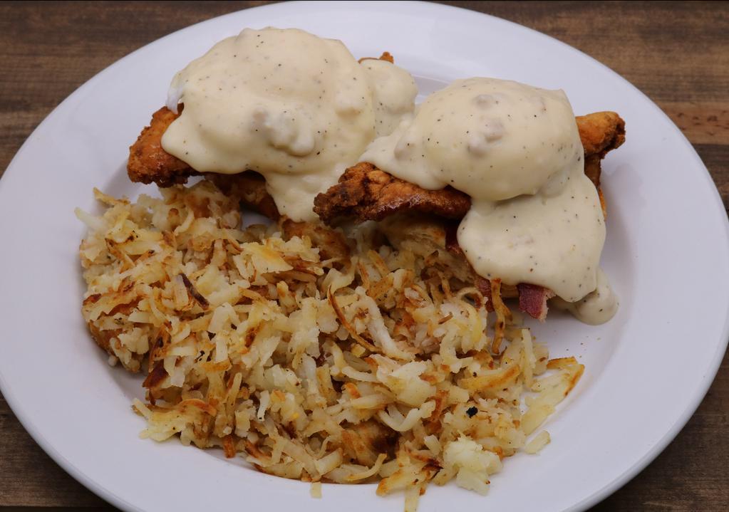 Southern Benny · Bacon, fried chicken, poached eggs, toasted
biscuit topped with Country Sausage Gravy.
Served without hollandaise.