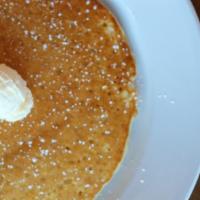 Solo House Pancake · Made from scratch, sugar dusted pancake
served with whipped butter.