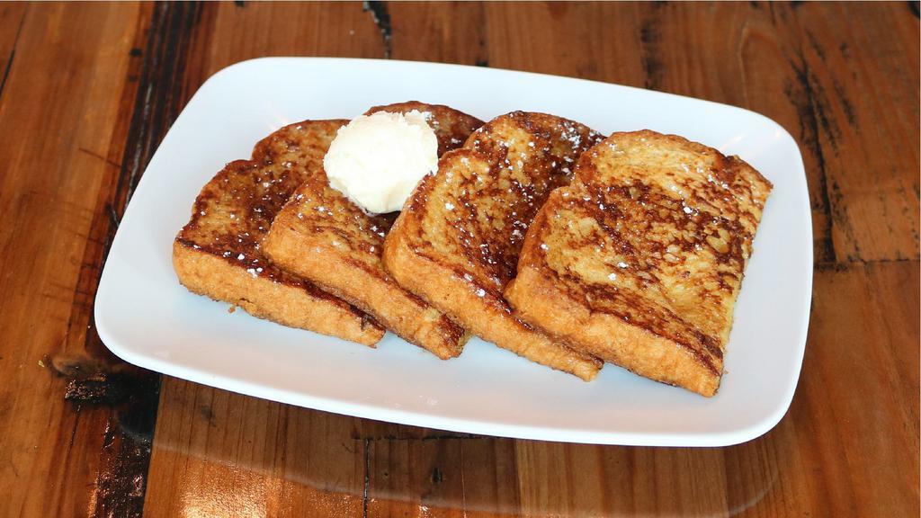 Petit Caramelized Brioche French Toast · Vegetarian. Sugar dusted brioche served with whipped butter.