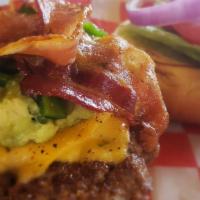 Guacamole Burger · BURGER TOPPED WITH GUACAMOLE, BACON, FRESH JALAPENOS, JACK CHEESE & CHIPOTLE MAYO. WITH LETT...
