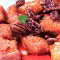 Asian Pecan · Lightly battered chicken or shrimp stir-fried with bell peppers pineapples and snow peas in ...