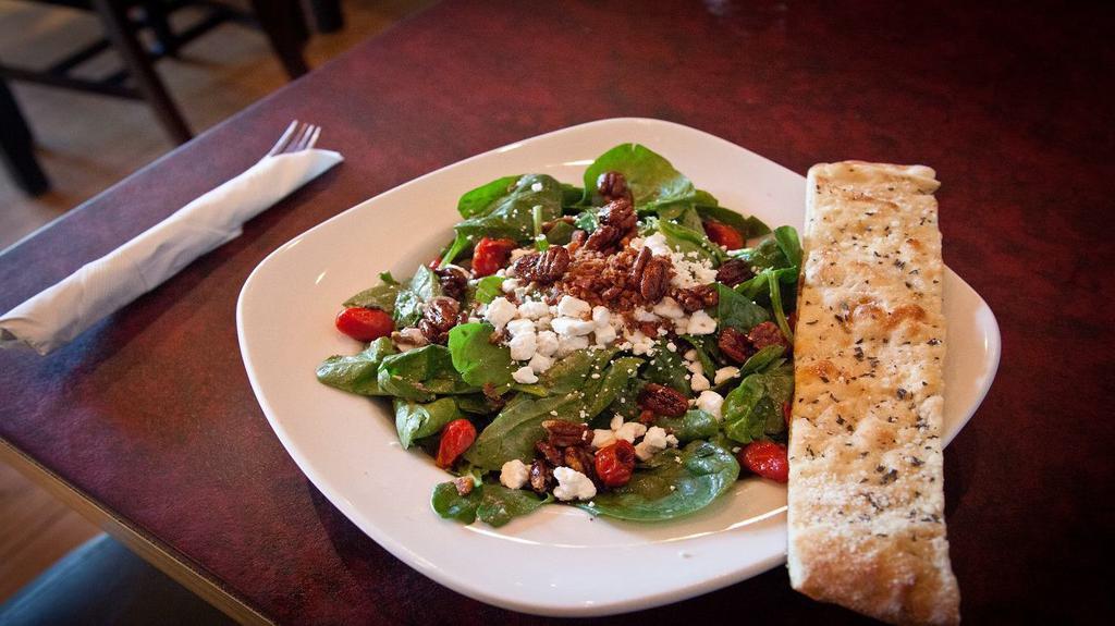 Spinach & Goat Cheese (Half) · Spinach, goat cheese, crimini mushrooms, bacon, caramelized onions, grape tomatoes, glazed pecans, housemade chianti vinaigrette.