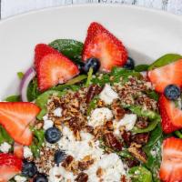 Very Berry (Full) · Spinach, red onion, blueberries, strawberries, candied pecans, quinoa, goat cheese and house...