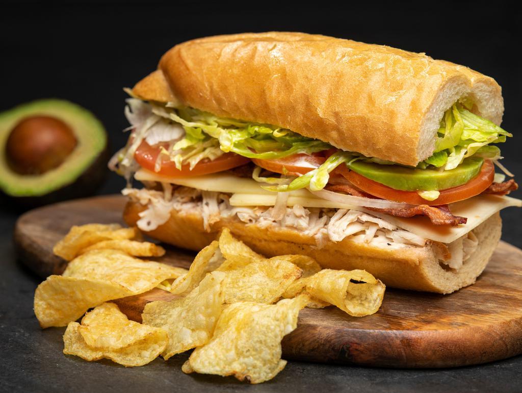 Turkey Bacon Avocado (Full) · With chips. Roasted turkey, bacon, avocado, mayo, lettuce, tomato, onion, provolone, red wine vinegar, olive oil.