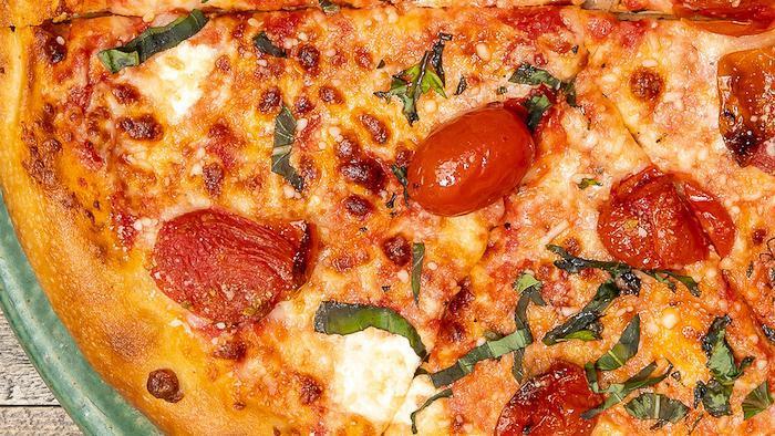 Margherita · Red sauce, fresh mozzarella, basil, roasted tomatoes, olive oil drizzle, spin! blend cheese.
