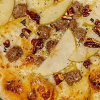 Sausage & Apple · Herbed olive oil glaze, italian sausage, apples, crushed glazed pecans, spin! blend cheese.