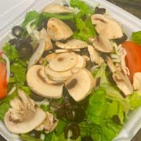 Bistro Salad · Black olives, tomatoes, mushrooms and mozzarella cheese Includes two garlic rolls.