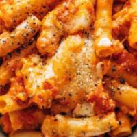 Baked Ziti · Baked with ricotta cheese and baked with marinara sauce. Includes salad and two garlic rolls.